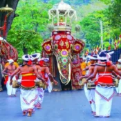 Kandy Esala Perahera procession with traditional dancers, drummers and decorated elephants in Kandy, Sri Lanka