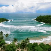 Southern Sri Lanka beach with palm trees and the Indian Ocean in December